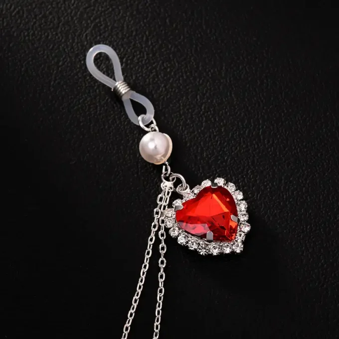 A Trendy And Sexy Red Artificial Gem Body Chain For Women, Featuring Exquisite Design And Fashion.