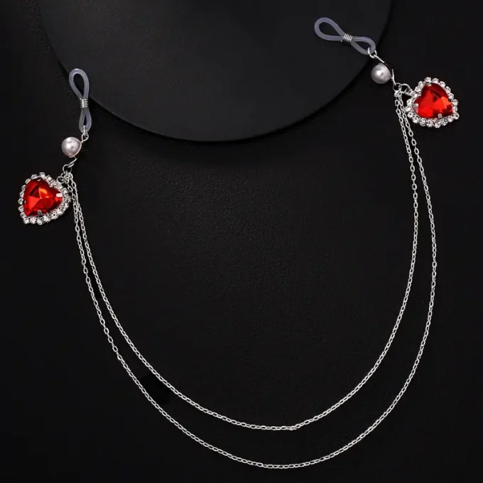 A Trendy And Sexy Red Artificial Gem Body Chain For Women, Featuring Exquisite Design And Fashion.